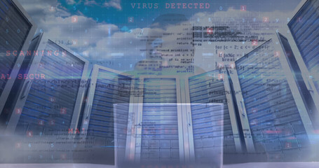 Fototapeta na wymiar Image of cyber attack warning over hacker in server room