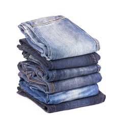 Stack of blue jeans on a white background