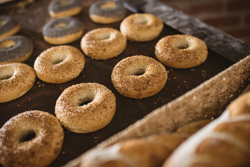 Close-up of donuts arranged on table in bakery