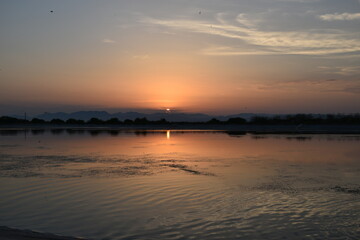Naklejka premium Reflejo de un atardecer. 