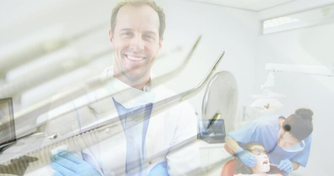 Animation of caucasian male dentist over medical tools