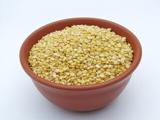 Moong dal in a bowl isolated on white background 