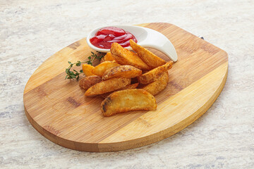 Fried rustic potato with tomato ketcup
