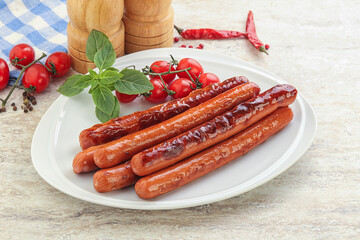 Roasted sausages in the plate