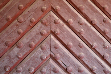Antique wooden door. Entrance to the fortress.