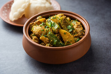 Aloo Patol sabzi made using pointed gourd and potato served with fried Luchi or poori, Bengali food