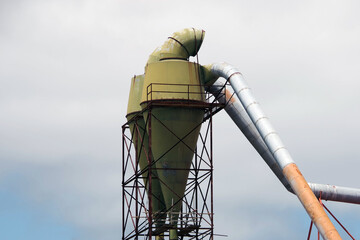 Old tall double silo in a defunct shipyard