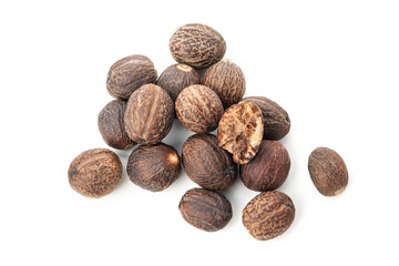 Concept of spices and condiments, nutmegs isolated on white background