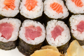 Sushi uramaki with different fish, close-up