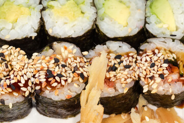 Sushi uramaki with different filling, close-up