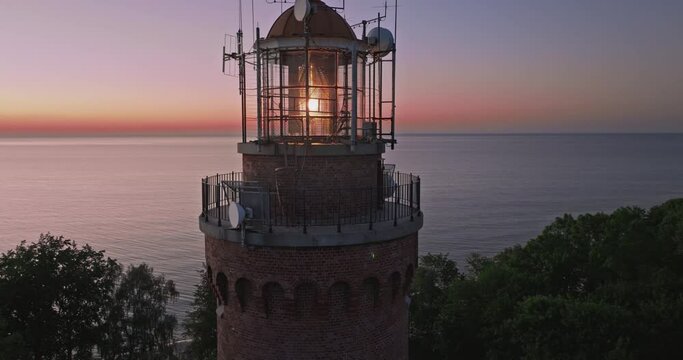 Aerial view of Baltic Sea. Light beam in Lighthouse.