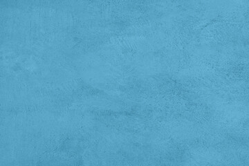 Light mint blue colored low contrast Concrete textured background. Empty colourful wall texture with copy space for text overlay and mockups. 2023, 2024 color trend