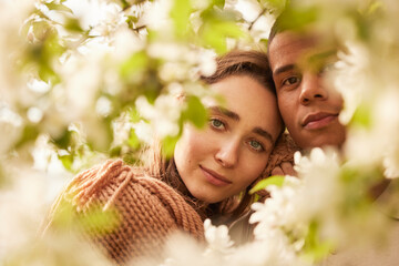 Happy couple posing in park