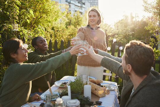 Friends having meal in garden