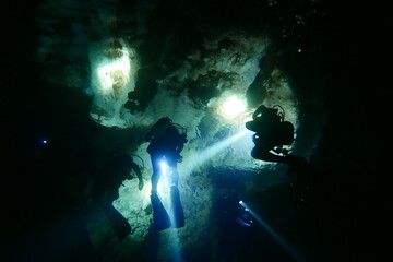 Scuba diving at chandelier cave in Palau. Diving on the reefs of the Palau archipelago.