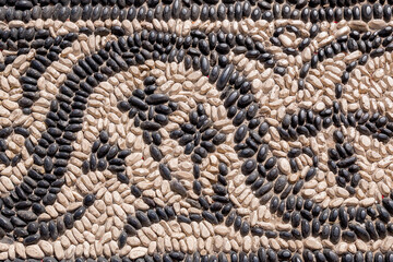 Pebble stone pavement. Symi Island, Greece