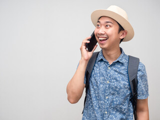 Traveler man blue shirt cheerful talking mobile phone with holiday