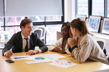 Shot of a group of businesspeople in a meeting at work