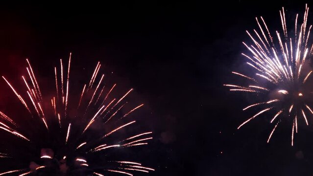 Colorful fireworks. launch of the festive fireworks. 4K slow motion clip of wonderful of fireworks. Magnificent holiday light representation. Beautiful fireworks show on Independence day 120 fps