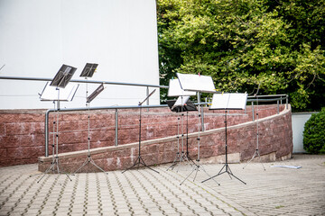 Many music stands for an orchestra in the open air