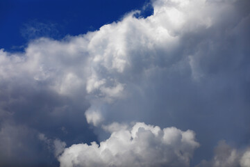 High clouds in the summer sky. Sky background. Meteorological observations of the sky.