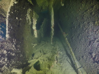 Diving on the ship wrecks of the Palau archipelago. These ship wrecks were from Japanese Navy at...