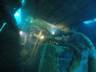 Diving on the ship wrecks of the Palau archipelago. These ship wrecks were from Japanese Navy at...