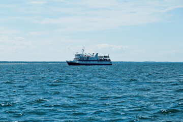 Obraz premium motor yacht in the sea , ocean . yacht on blue waves