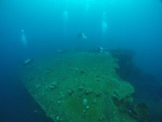 Diving on the ship wrecks of the Palau archipelago. These ship wrecks were from Japanese Navy at...