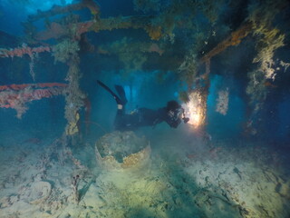 Diving on the ship wrecks of the Palau archipelago. These ship wrecks were from Japanese Navy at...