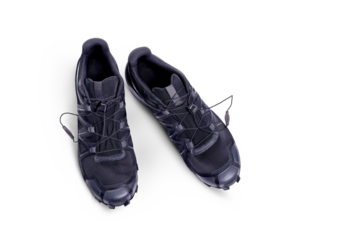 A top view of black trainers, sneakers Isolated on a flat background.
