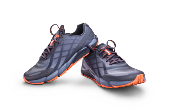 A front view of grey and orange trainers, sneakers Isolated on a flat background.