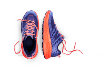 A top view of purple and orange trainers, sneakers Isolated on a flat background.