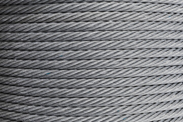 Steel rope is on a winch, abstract industrial background photo