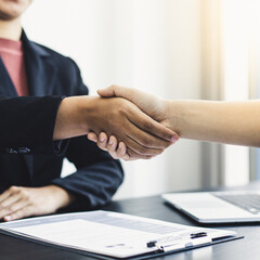 Employer or HR department welcomes new employees, Shaking hands with congratulations or achieving business and income success, Hand shake concept.