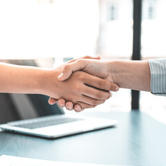Obraz na płótnie Canvas Employer or HR department welcomes new employees, Shaking hands with congratulations or achieving business and income success, Hand shake concept.
