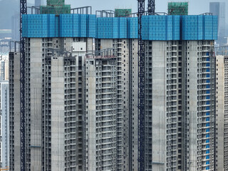 Construction of high-rise buildings in City, industrial construction site