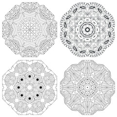 Hand drawn zentangle set of 4 mandalas for coloring page.