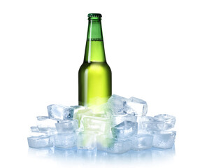 Bottle of beer and ice cubes isolated on white