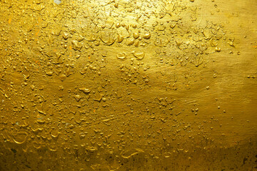 Golden texture peeling swelling abstract background.