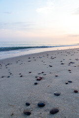 Pebbles at sunrise on the Baltic Sea, Poland