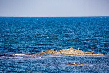 Fototapeta premium By the sea, Black Sea, Bulgaria. Rocks in the blue water