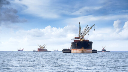 Fototapeta premium A Dredging ship floats in the sea