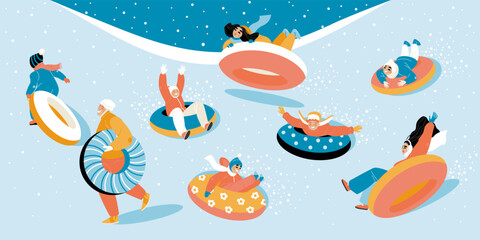 Children on a snow tubing slide down a hillside during a snowfall. Happy kids actively spend time on winter holidays.