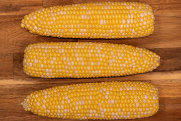 three clean ears of corn