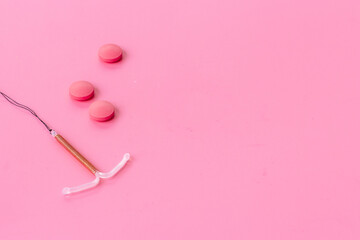 T-shaped intrauterine contraceptive device with medicine pills. Alternative methods of contraception