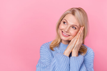 Photo of sleepy senior blond lady hands head look promo wear blue pullover isolated on pink color background