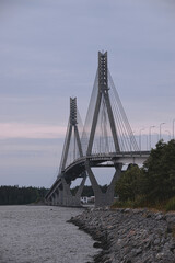 Obraz premium view of the bridge on a river in the early morning