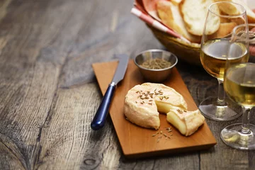 Munster (washed rind cheese from Alsace, France ) with cumin seeds © uckyo