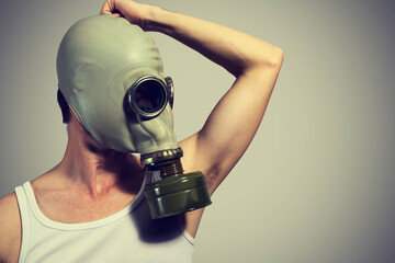 A man in a t-shirt with the smell of sweat and mask
